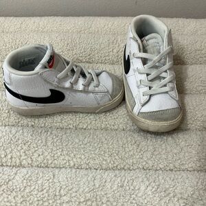 Nike White and Black Sneakers with High-Top Design
